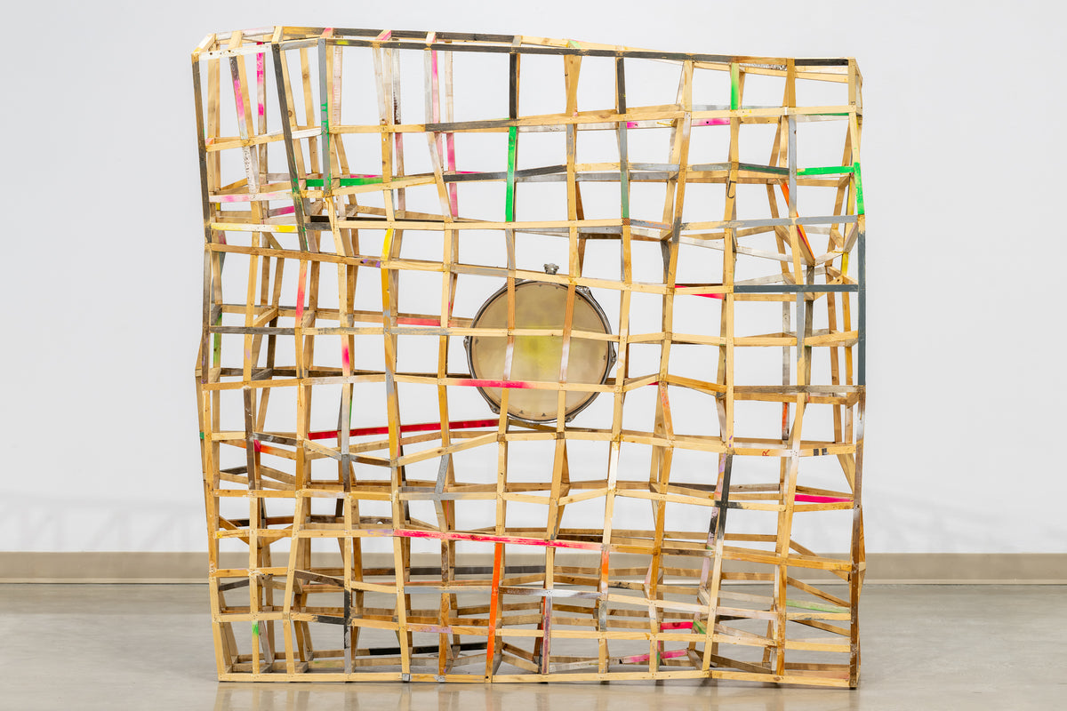 Samuel Roy-Bois, My Sun, 2024. A freestanding lattice of thin wood strips with bright paint marks, holding a drum at its centre