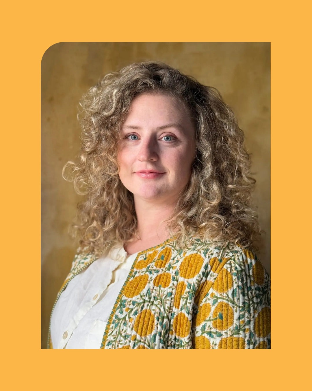A Photo of Jessie McNeil with an orange border