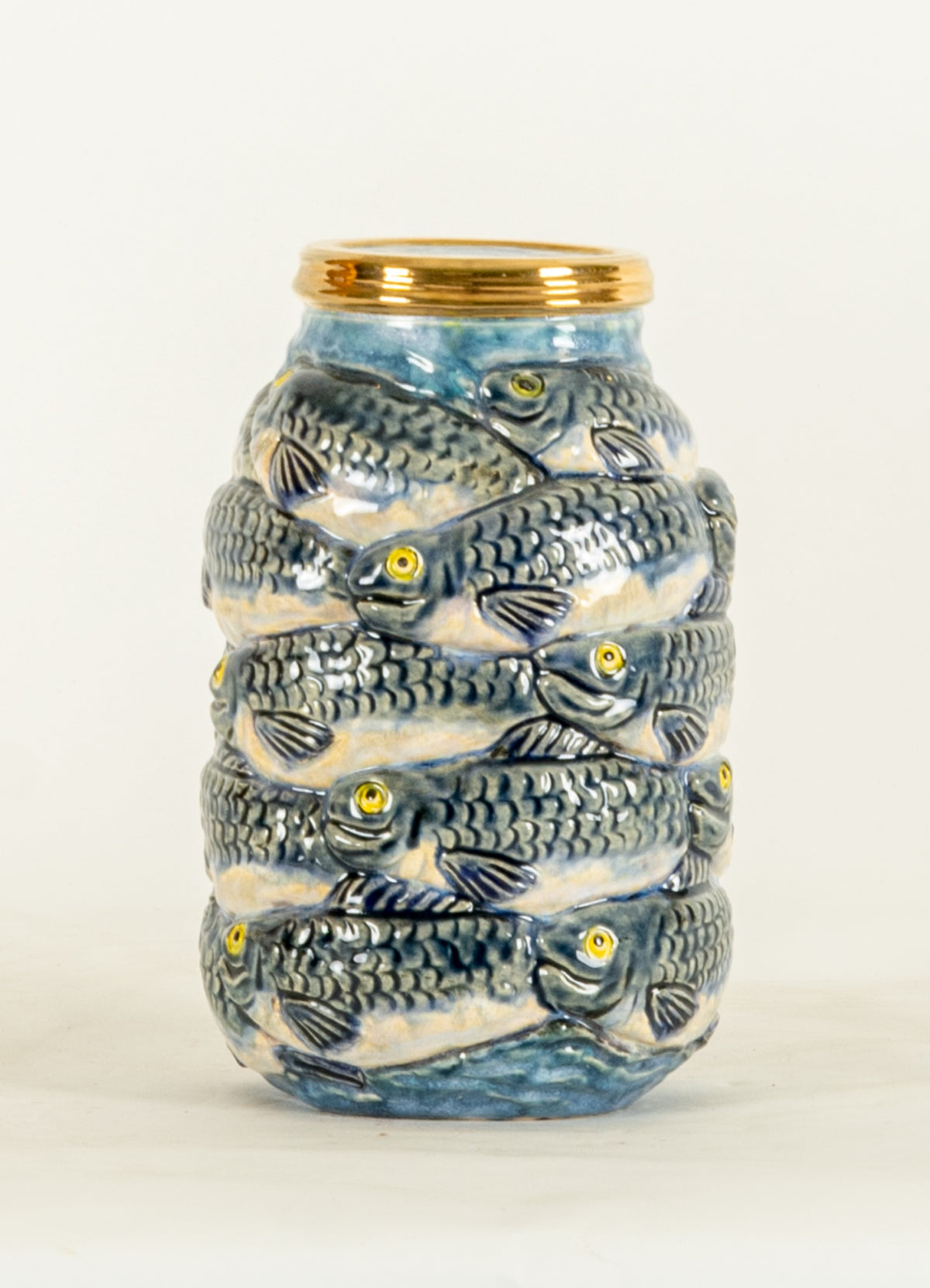 Victor Cicansky, Gallon of Fish, 2010. A ceramic jar covered by fishes.
