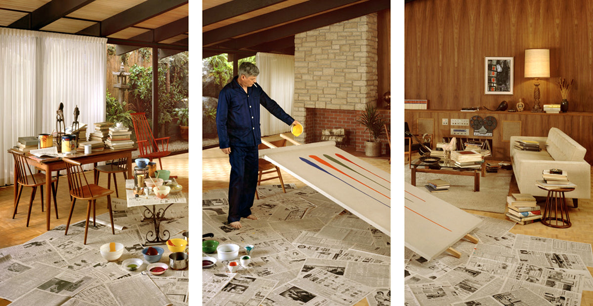 Rodney Graham, The Gifted Amateur, November 10th, 1962, 2007. A photograph depicting a man dripping paint on a large canvas in the middle of his living room with newspaper on the floors.