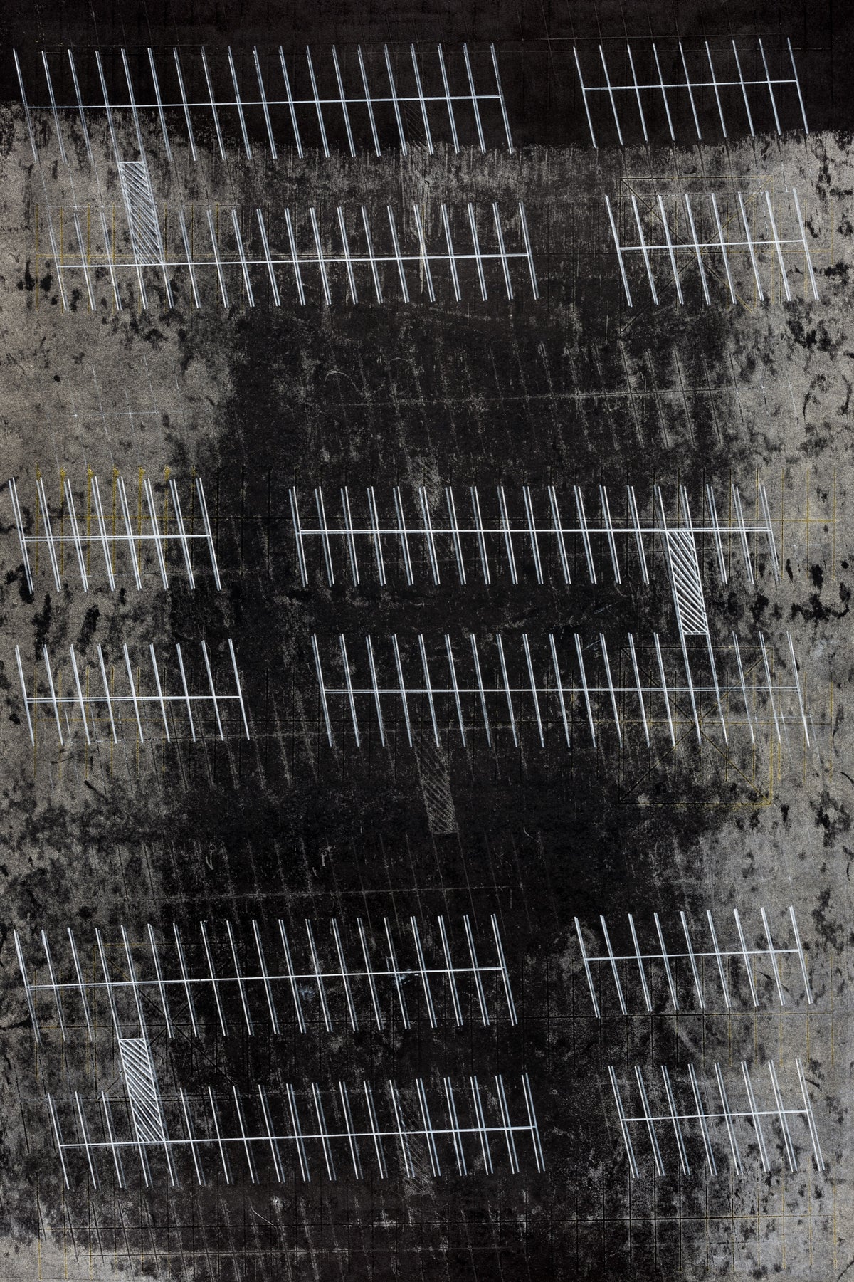 Mark Johnsen, Vacant Lot, I, 2022. Multiple sets of white diagonal lines with a straight line striking though against a black and grey background.