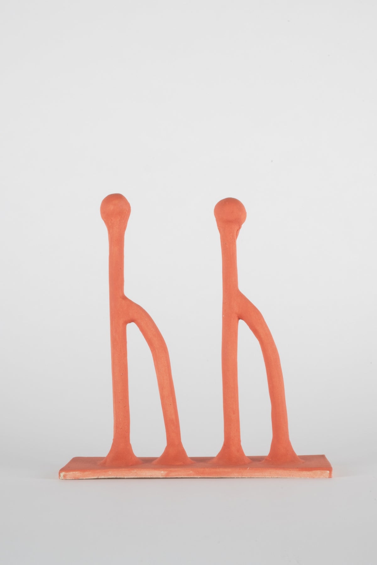 Parvin Peivandi, Utopian Rug, 2023. Ceramic figurative sculptures in soft green, yellow, pink and orange. View 15 of 24.