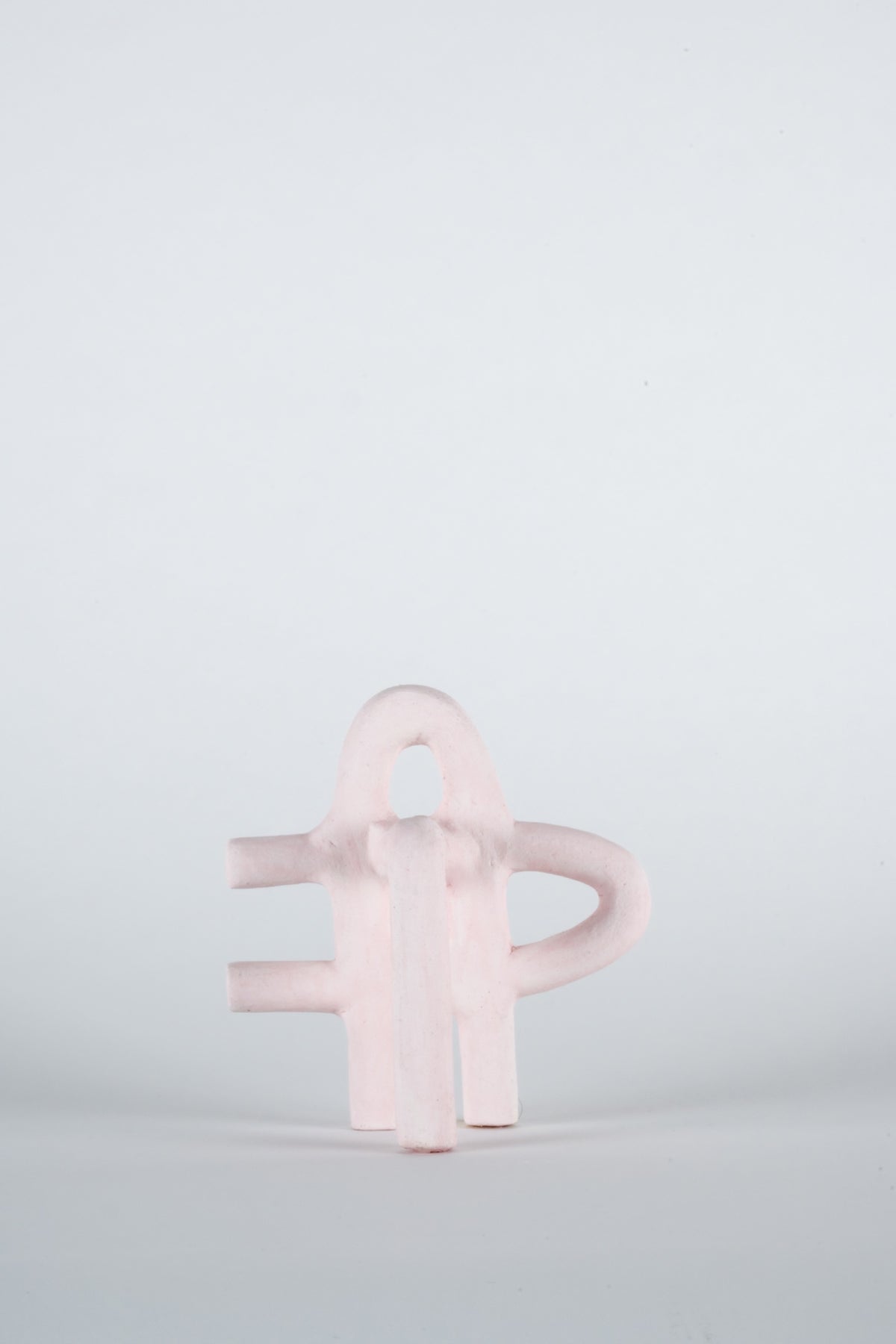 Parvin Peivandi, Utopian Rug, 2023. Ceramic figurative sculptures in soft green, yellow, pink and orange. View 17 of 24.