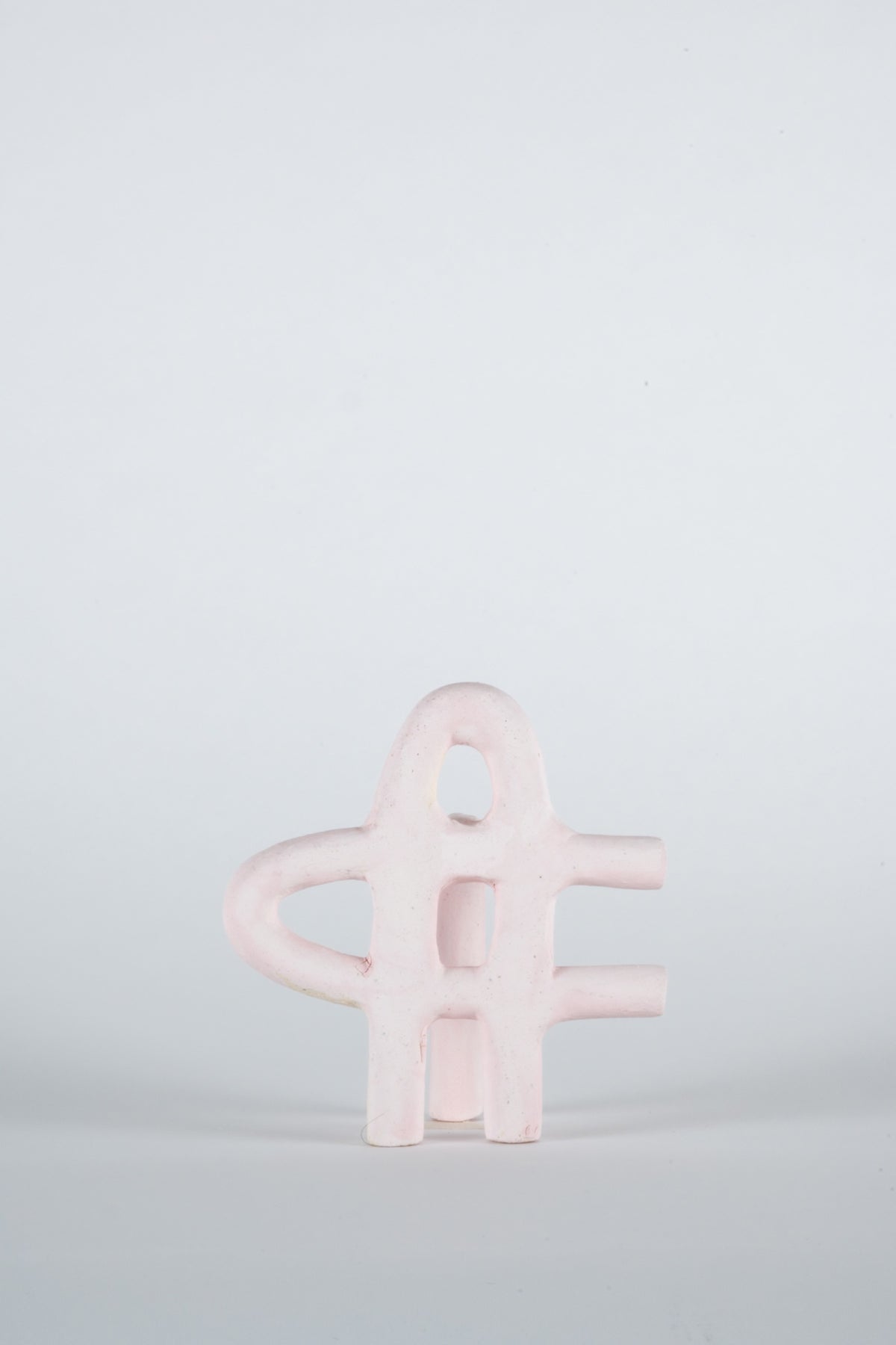 Parvin Peivandi, Utopian Rug, 2023. Ceramic figurative sculptures in soft green, yellow, pink and orange. View 20 of 24.